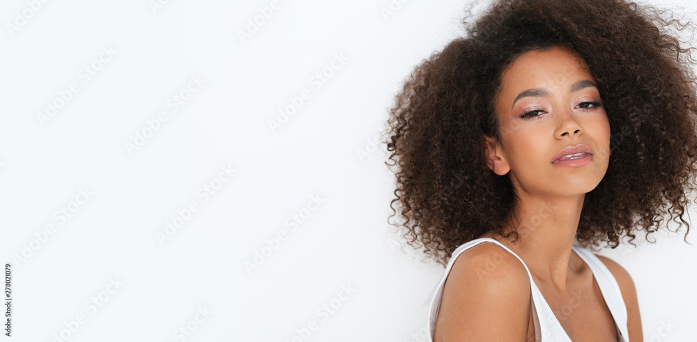 Natural afro -amercian beauty in basic white clothes.  - obrazy, fototapety, plakaty 