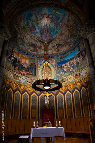 The beauty of the Temple of the Sacred Heart in Barcelona.Temple of the Sacred Heart wall paintings. Icons and the story of the beginning of life.
