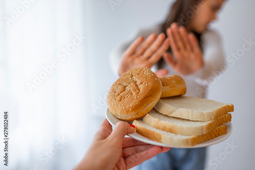 Photos Young woman suffers from a gluten