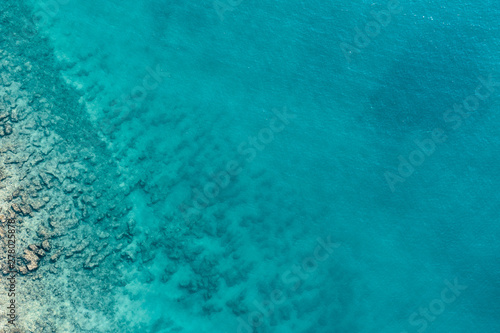 Aerial view of the sea and stones in the summer