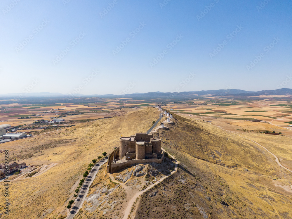 traditional windmills and castle in Don Quijote´s land