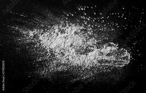 White powder isolated on black background, top view with clipping path