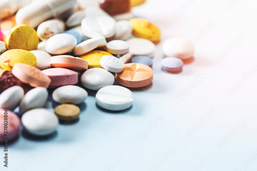 Pills and capsules, social issue, medicine and the pharmaceutical industry Pills and capsules, social issue, medicine and the pharmaceutical industry
