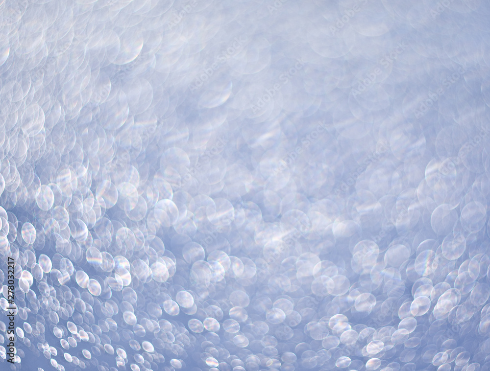 Obraz premium Light-blue background of shining drops of water