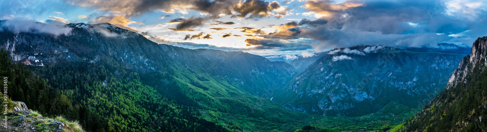 Fototapeta premium Montenegro, XXL panorama of tara river canyon nature landscape from aerial view of mount curevac in spectacular dawning light in durmitor national park near zabljak