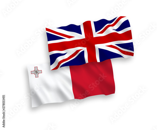National vector fabric wave flags of Great Britain and Malta isolated on white background. 1 to 2 proportion.