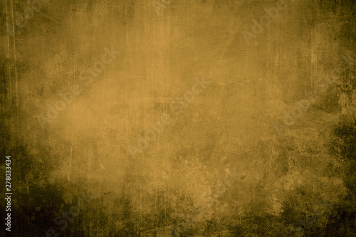 Yellow ocher grungy canvasbackground or texture photo