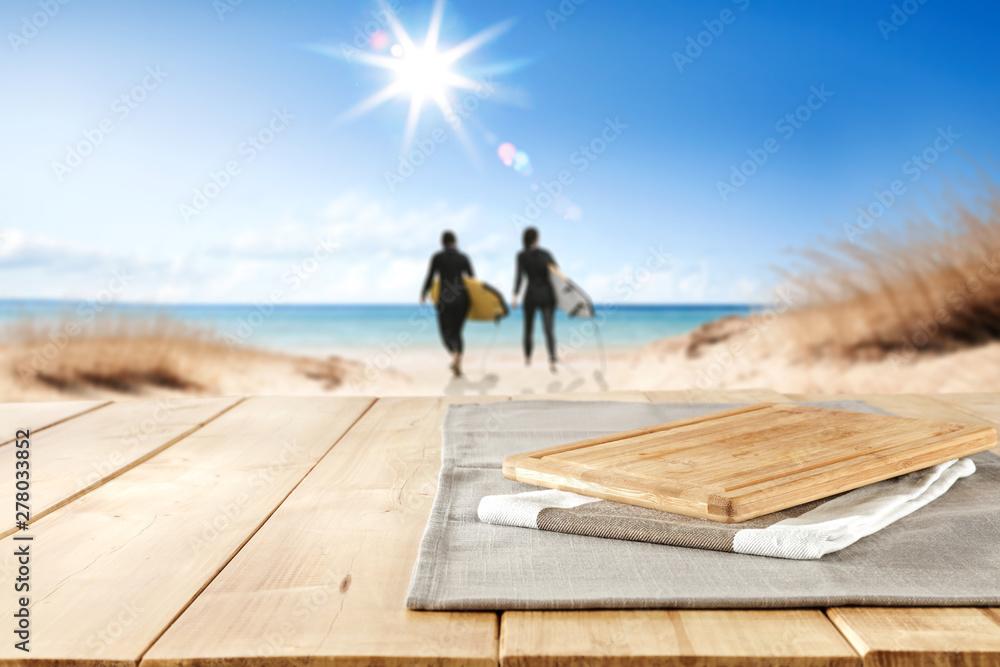 Wooden table background in the sunshine in the summer