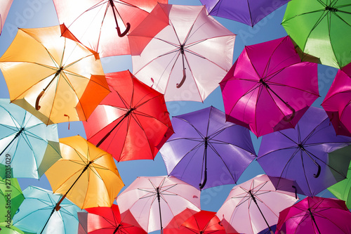 Colorful umbrellas background. Street decoration in France.