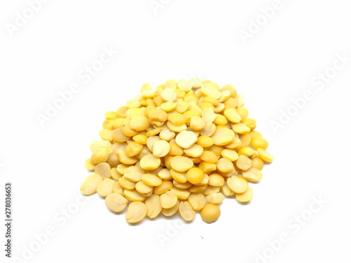 A picture of split pigeon peas on white background