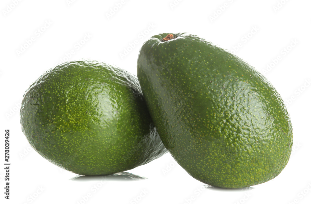 Fresh ripe tasty avocado on white isolated background. tropical fruit close-up Fresh ripe tasty avocado on white isolated background. tropical fruit close-up