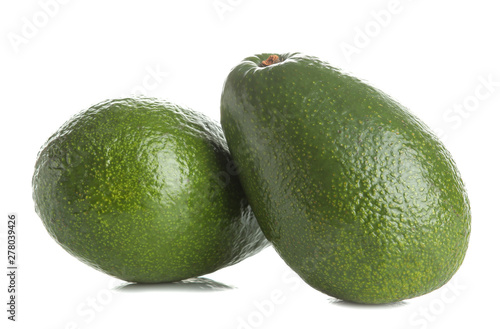 Fresh ripe tasty avocado on white isolated background. tropical fruit close-up