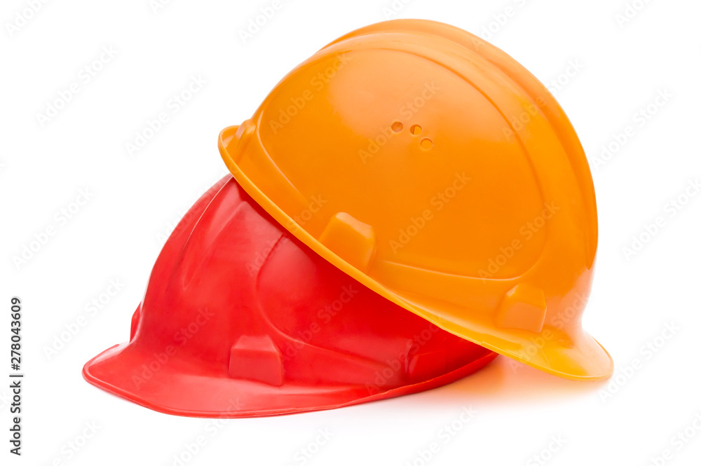 Two hard hats for workers on white. Two hard hats for workers on white.