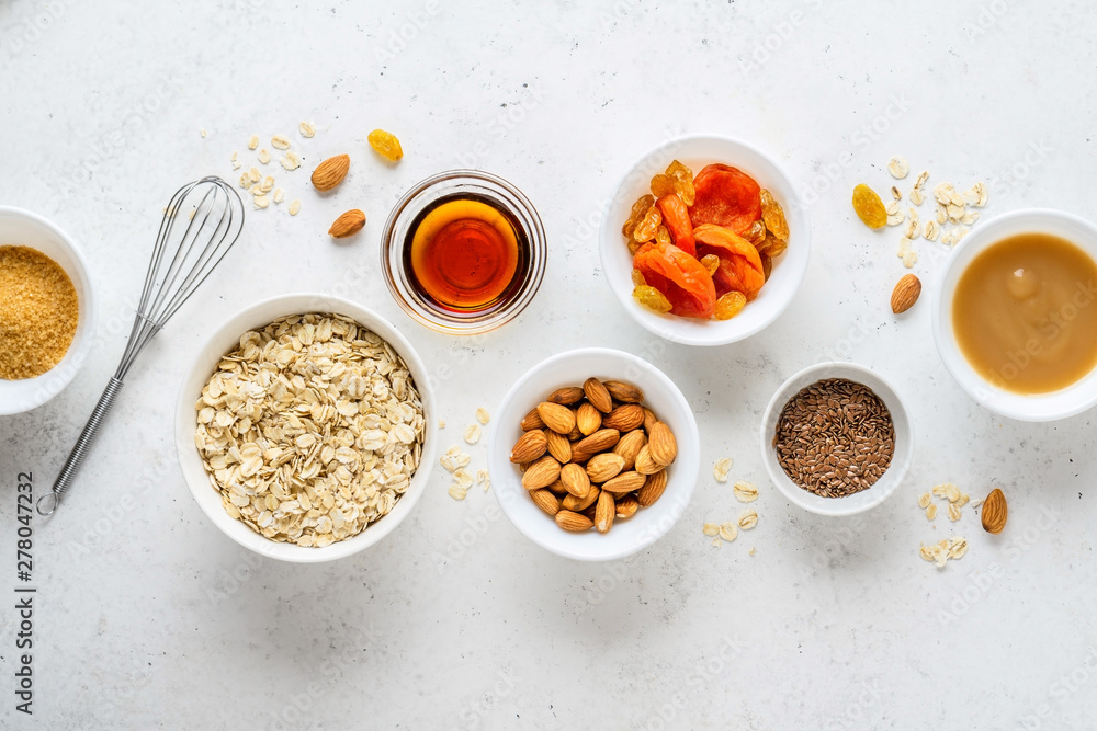Ingredients for cooking homemade granola (muesli). Healthy breakfast. Ingredients for cooking homemade granola (muesli). Healthy breakfast.