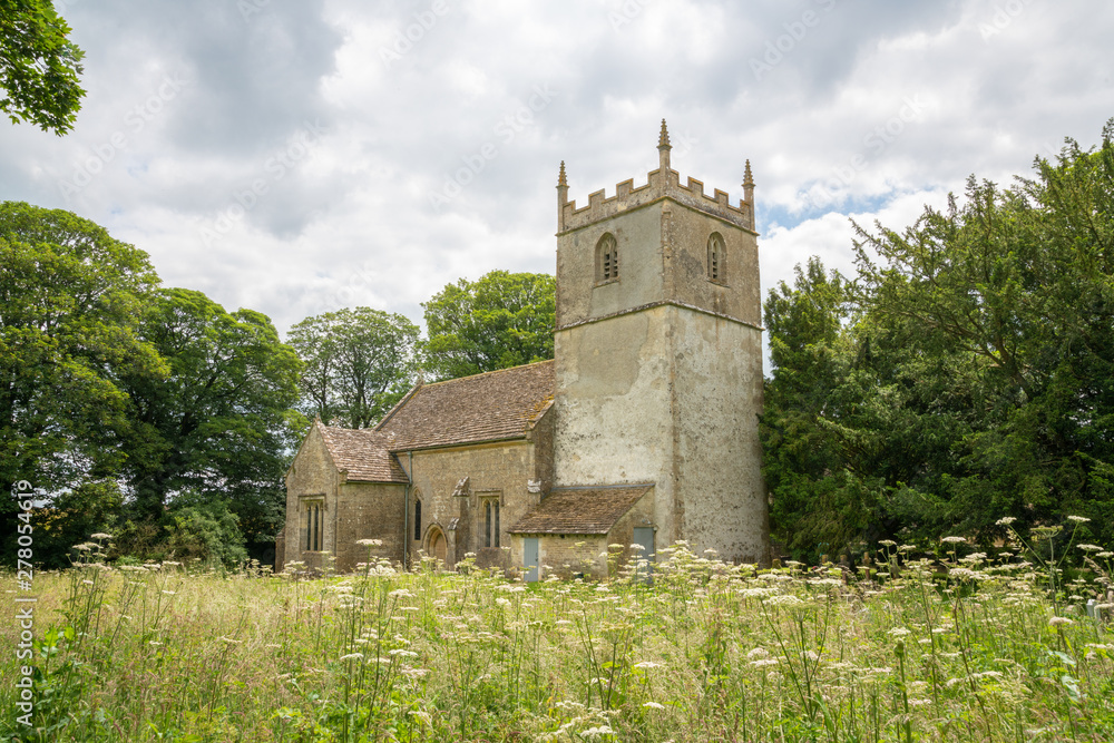 St Mary's Church, Beverston. A Norman church with an original Norman Tower. Beverston is a small Cotswolds village, Gloucestershire, United Kingdom