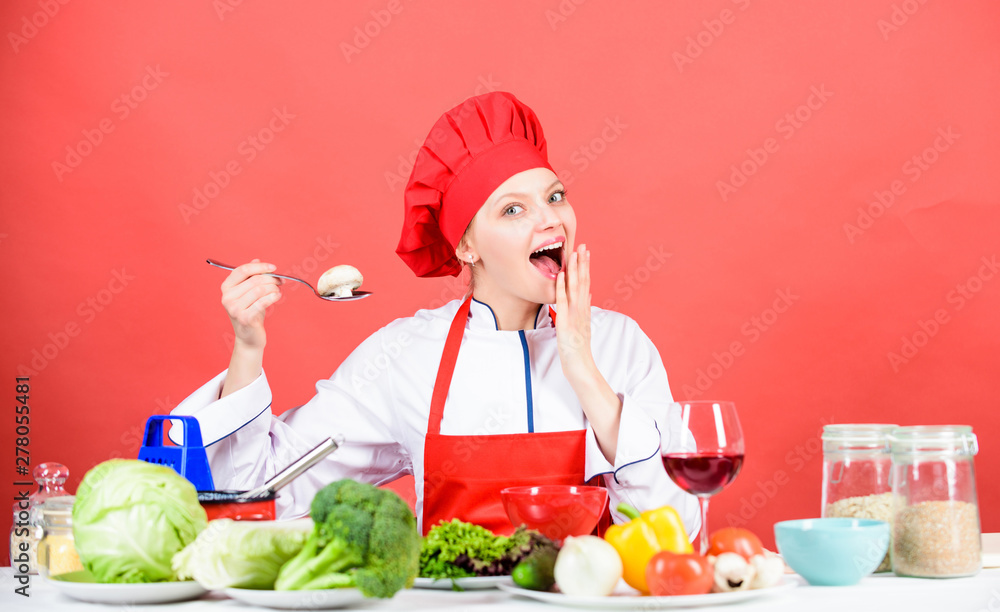 Cooking meal. Delicious recipe concept. Girl at kitchen table. Cooking food and housekeeping. Housewife routine. Cooking healthy food. Professional cooking tips. Woman chef try taste eat food Cooking meal. Delicious recipe concept. Girl at kitchen table. Cooking food and housekeeping. Housewife routine. Cooking healthy food. Professional cooking tips. Woman chef try taste eat food