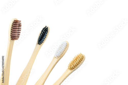 Toothbrushes made of bamboo on a white background close-up. Zero waste concept, no plastic,copy space