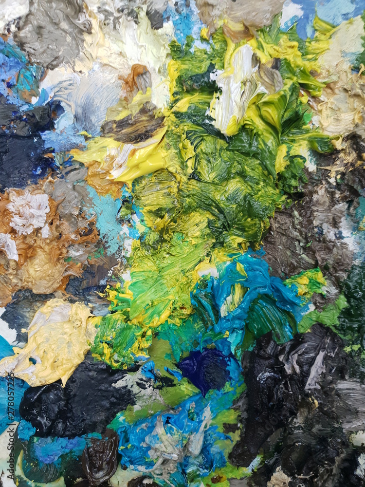 Naklejka premium the texture of the oil paint palette artist