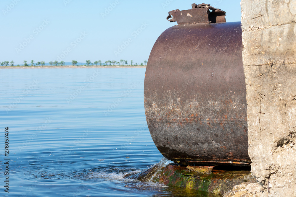 Discharge of toxic or contaminated water into a river or lake. Discharge of toxic or contaminated water into a river or lake.