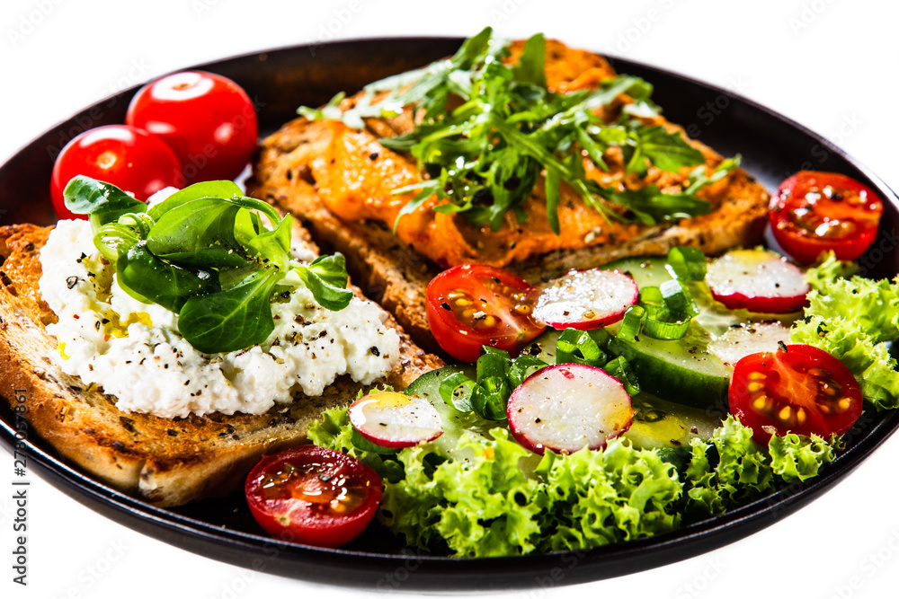 Breakfast - sandwiches with vegetable salad Breakfast - sandwiches with vegetable salad