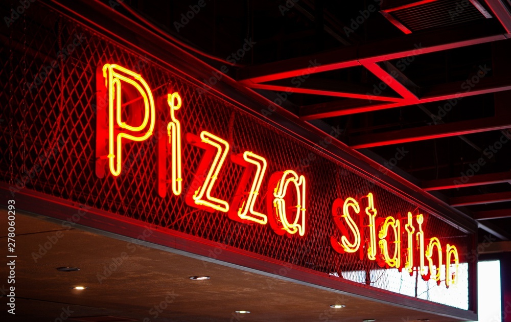 Pizza station red neon light tube decoration sign in restaurant bar