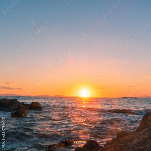 warm summer sunset at the sea