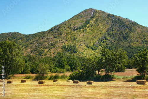 Bosnian countryside on a hot summer day. Mountain valley in Dinaric Alps. Bosnia and Herzegovina  Republika Srpska