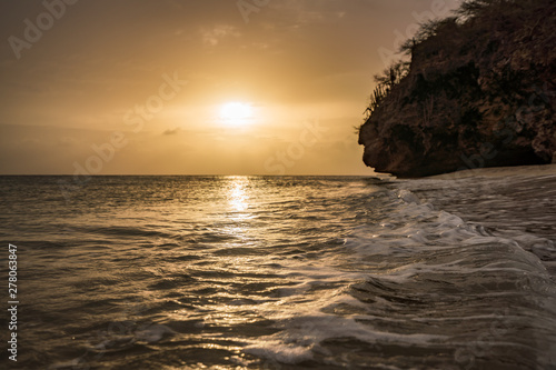 A fantastic sunset at the beach with a bonfire and BBQ on the island of Curacaio