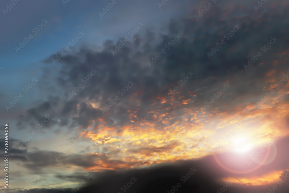 Dramatic atmosphere panorama view of fantasy twilight sky and clouds with vivid shiny golden sunlight.