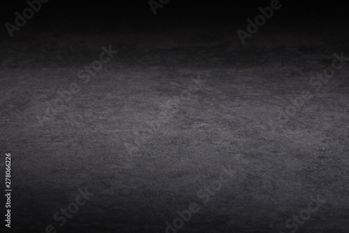Dark gray and black stone background or texture