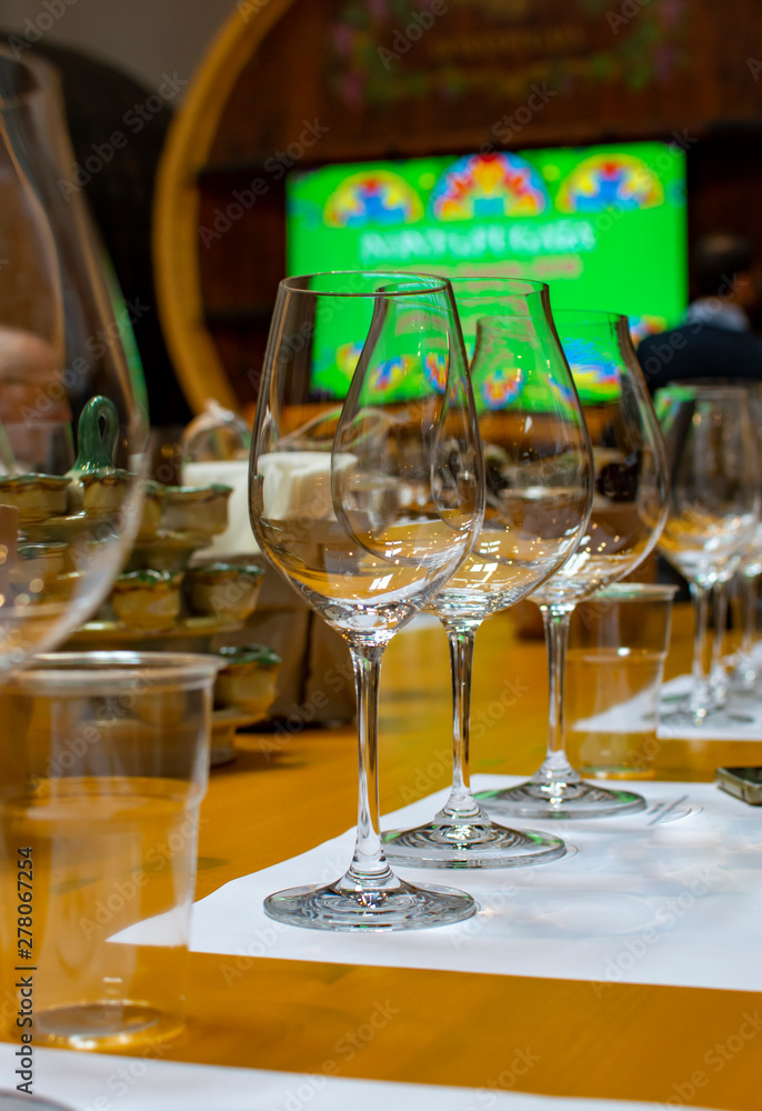 Fototapeta premium Professional wine tasting, sommelier course, clean empty wine glasses for different wines
