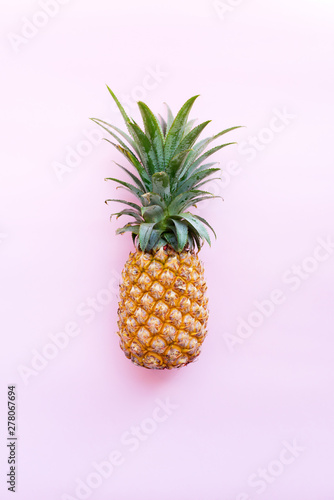 Pine apple tropical fruit on pink background. Raw