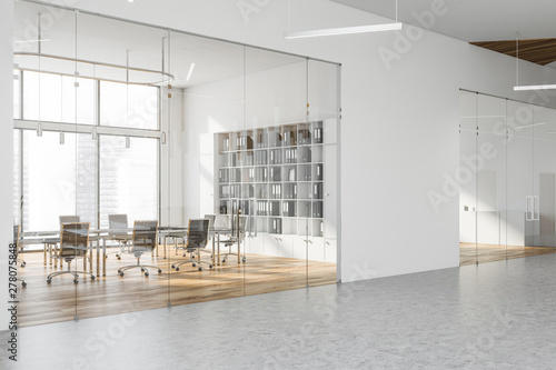 Foto White meeting room with bookcase