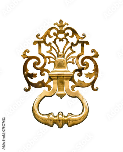 Door knocker made of brass on a front door, isolated on white background with clipping path