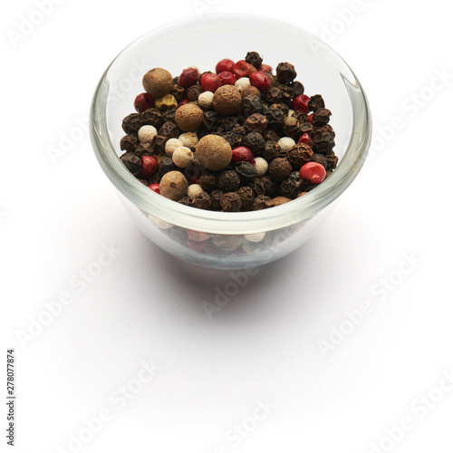 mix of peppers dried isolated in a glass plate