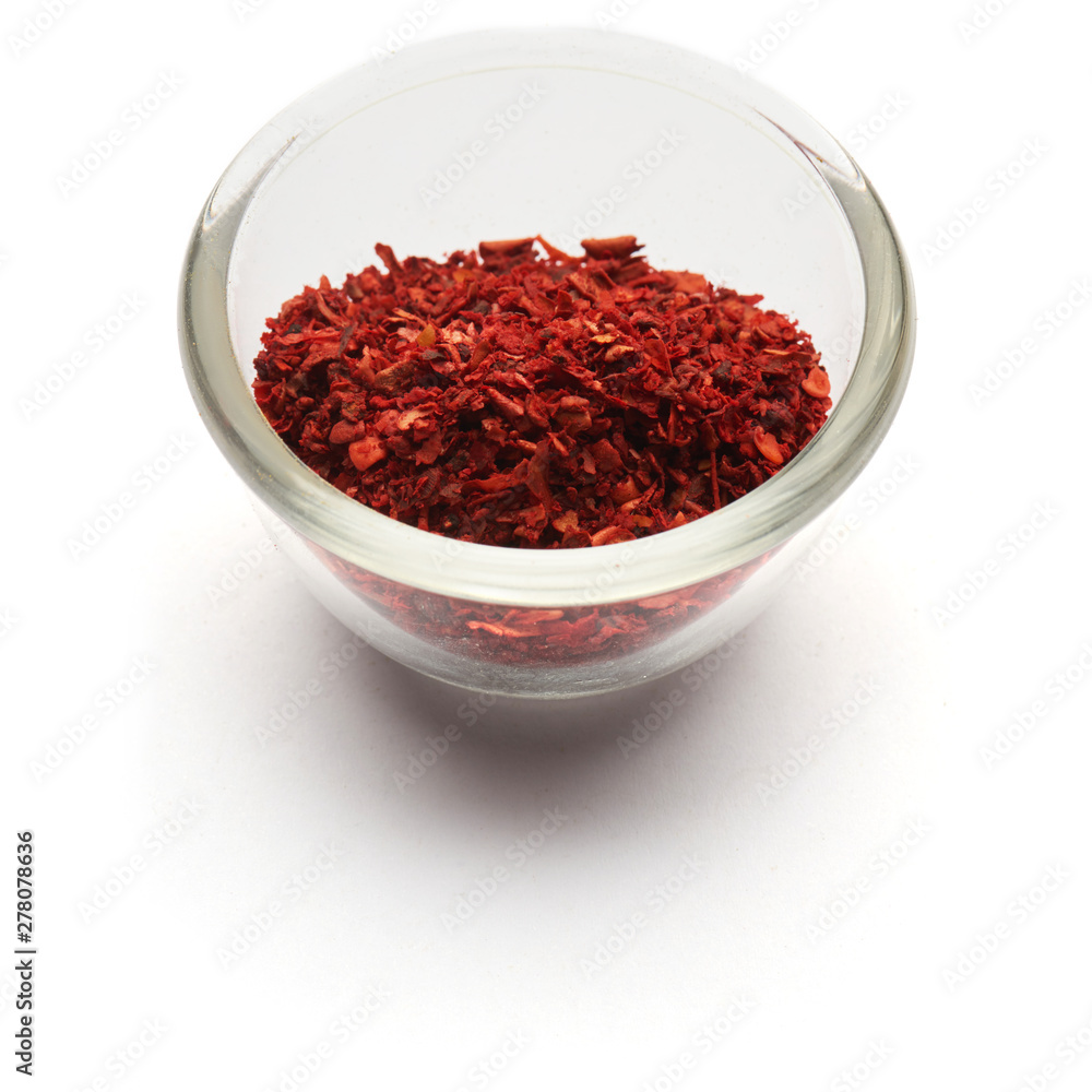 minced paprika isolated in a glass plate minced paprika isolated in a glass plate