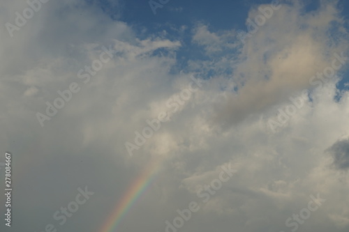Rainbow and Clouds with Blue Sky © Michael