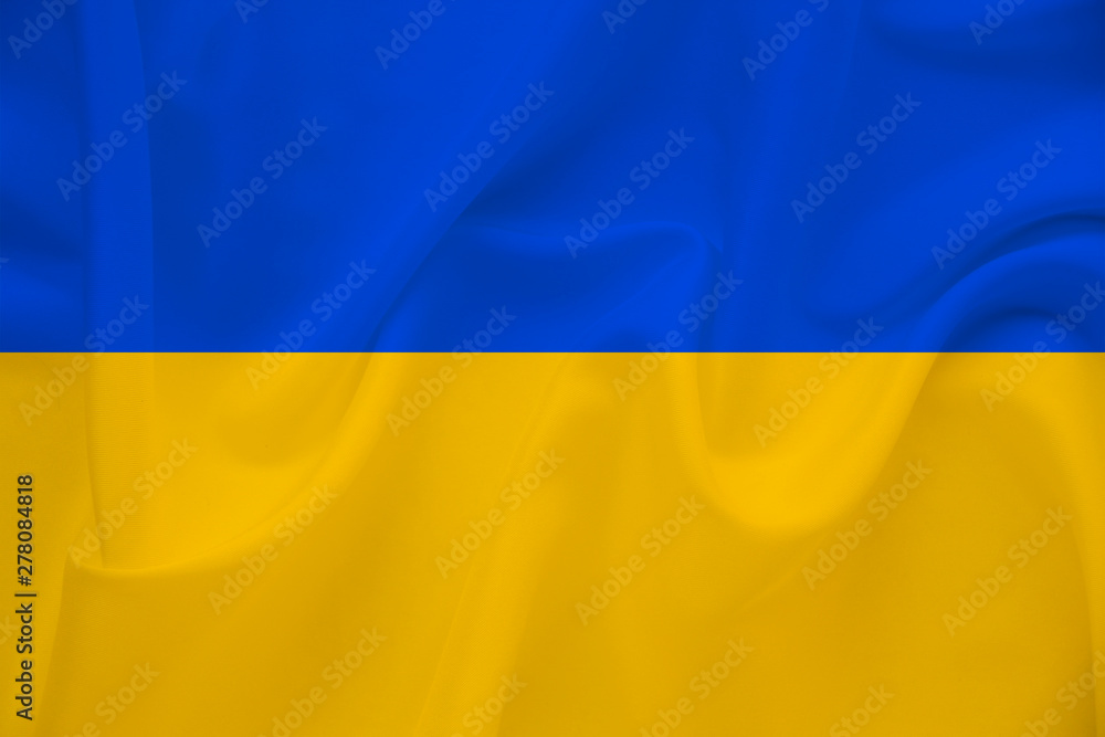 national flag of Ukraine on gentle silk with wind folds, travel concept, immigration, politics national flag of Ukraine on gentle silk with wind folds, travel concept, immigration, politics