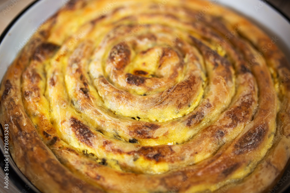 Traditional Bosnian homemade pie with cheese Traditional Bosnian homemade pie with cheese