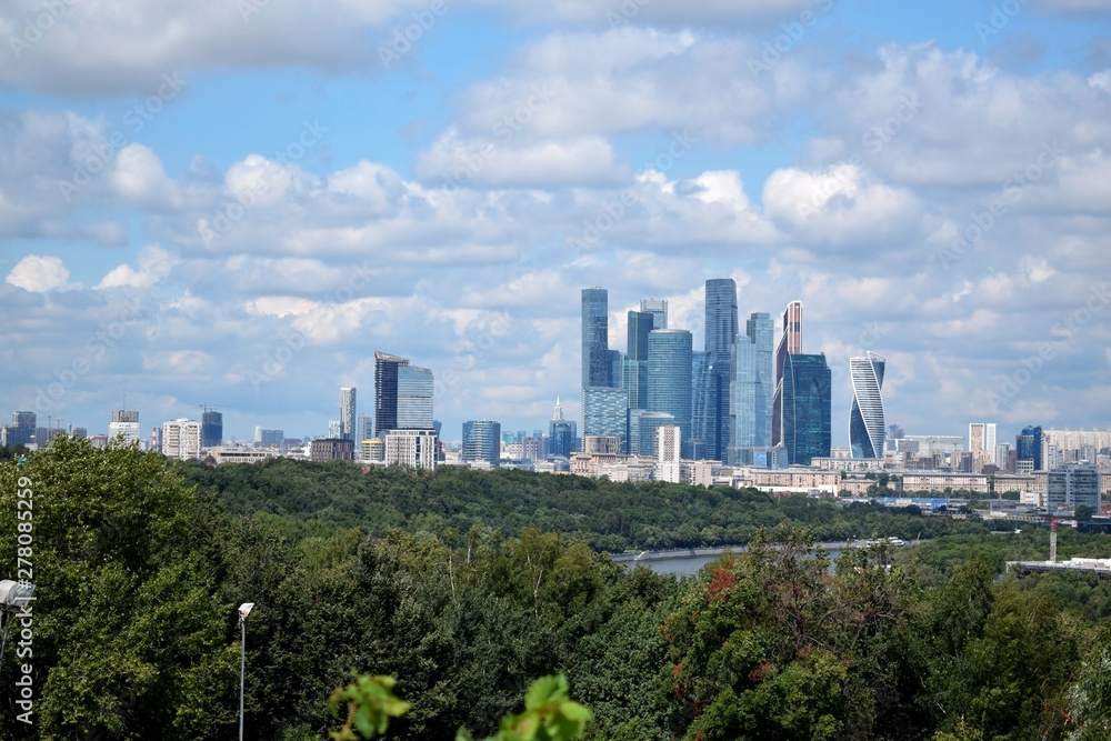 Moscow, Russia - July 8, 2019: The view of Moscow and cloudy blue sky from the Sparrow Hills observation deck on a sunny day