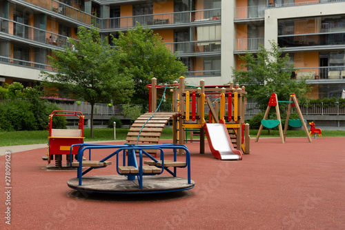 Modern apartment building with children's outdoor playground