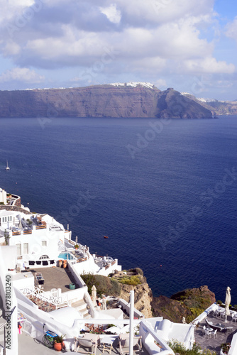 Beautiful island of Santorini  Greece. Traditional white greek houses against the backdrop of the sea. The city of Oia on the island of Santorini. Greek journey.