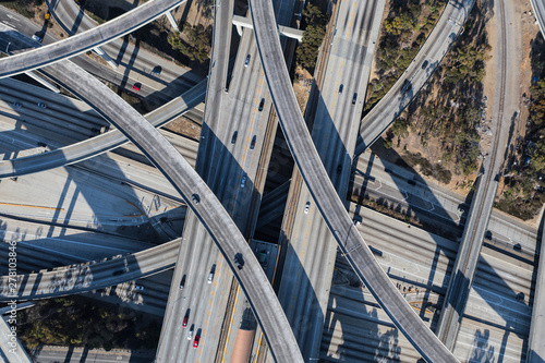 Afternoon aerial above the Harbor 110 and Century 105 freeways interchange ramps in Los Angeles, California. 