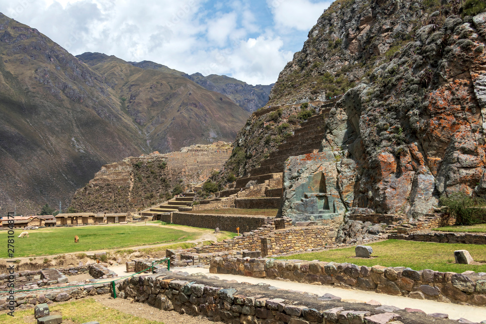 Ollantaytambo ruins, a massive Inca fortress with large stone terraces ...