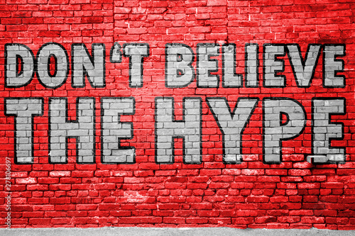 Don‘t Believe the Hype Graffiti on Brick Wall (English)