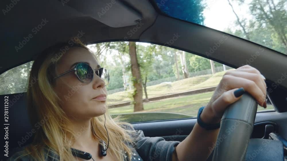 young woman driver driving a car young woman driver driving a car