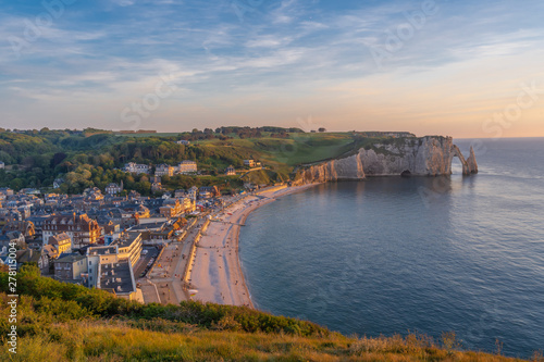 Etretat, France - 05 31 2019: Panoramic view of the cliffs of Etretat and the city at sunset