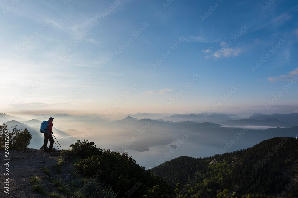 Mountaineers in the early morning with the Bavarian Alps, Herzogstand, lake Walchensee, Upper Bavaria, Bavaria, Germany, Europe Mountaineers in the early morning with the Bavarian Alps, Herzogstand, lake Walchensee, Upper Bavaria, Bavaria, Germany, Europe