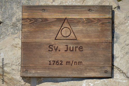 Wooden board on the peak Sv. Jure in Biokovo national park, Makarska, Croatia on June 19, 2019.