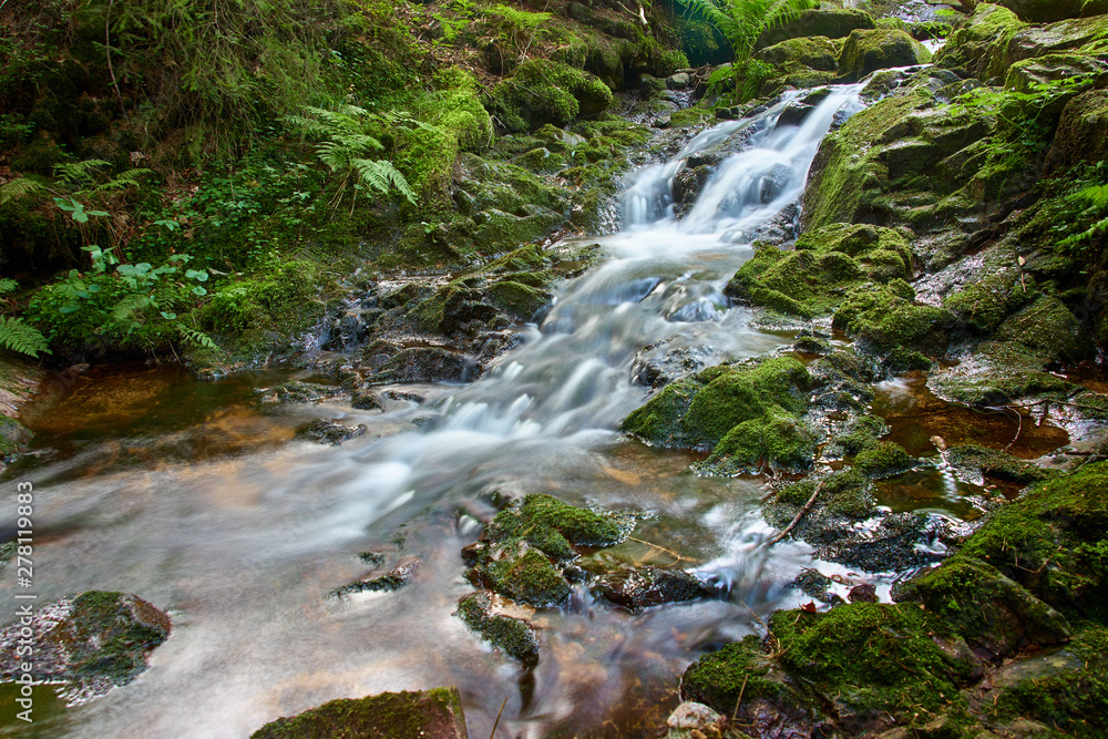 Obraz premium stormy mountain river, long exposure